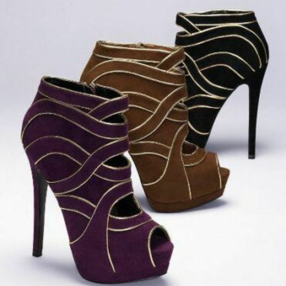 VICTORIA’S SECRET METALLIC-TRIM ANKLE BOOT 9